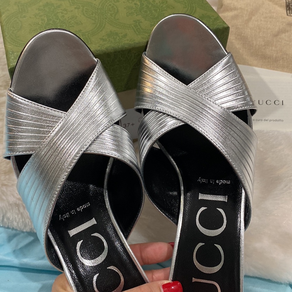 Brand new Gucci Silver mules. Who doesn’t love Gucci Heels? Never worn…so pretty